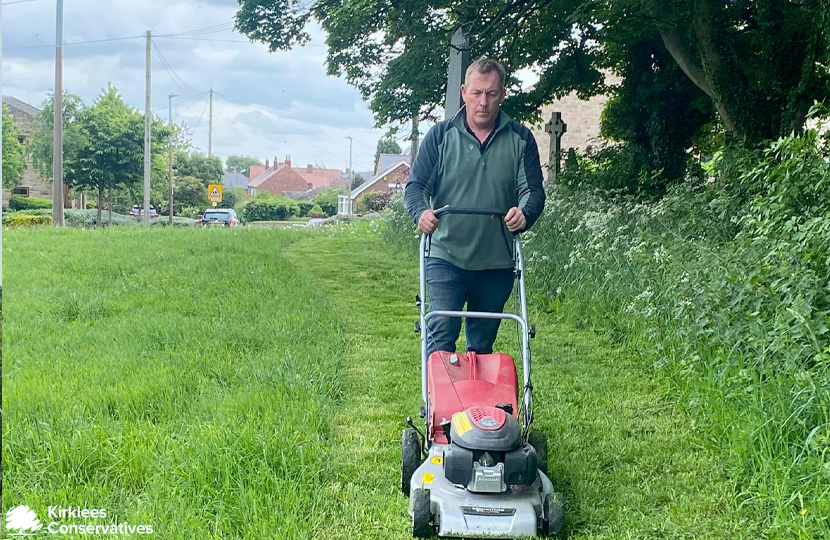 Cllrs Tim Bamford and Michael Watson helping tidy St Michael's Church