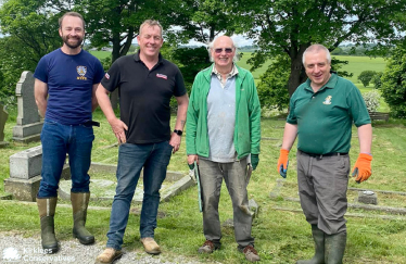 Cllrs Tim Bamford and Michael Watson helping tidy St Michael's Church